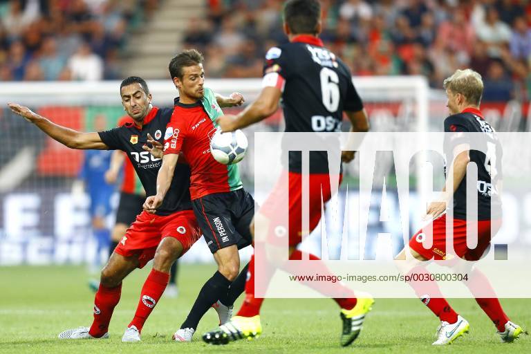 Nijmegen NEC Excelsior Football Ears Divisia season 2015 2016 12 08 2015 NEC player Christian Santos M with Excelsior player Adil Auassar L Excelsior player Rick Kruys R and Excelsior player Sander Fischer M NEC Excelsior
