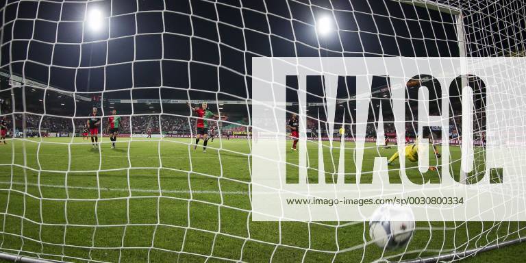 Nijmegen NEC Excelsior Football Eredivsie season 2015 2016 12 08 2015 Stadium the Goffert NEC player Navarone Foor has the 1 0 scored Excelsior keeper Filip Kurto R is no chance NEC player Kristjan Emilsson M cheered NEC Excelsior