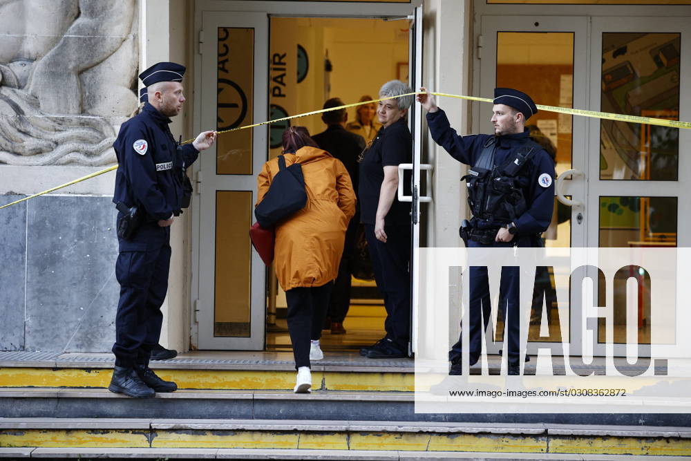 The Day After Knife Attack - Arras People arrive to the Gambetta high school in Arras, northeastern France on October 14, 2023, after a teacher was killed and two other people severely wounded in a knife attack. A man of Chechen origin stabbed to death a teacher and severely wounded two other adults on October 13 at a school in northeastern France, with prosectors opening a probe into a suspected act of terror. Photo by Raphael Lafargue ABACAPRESS.COM Arras France