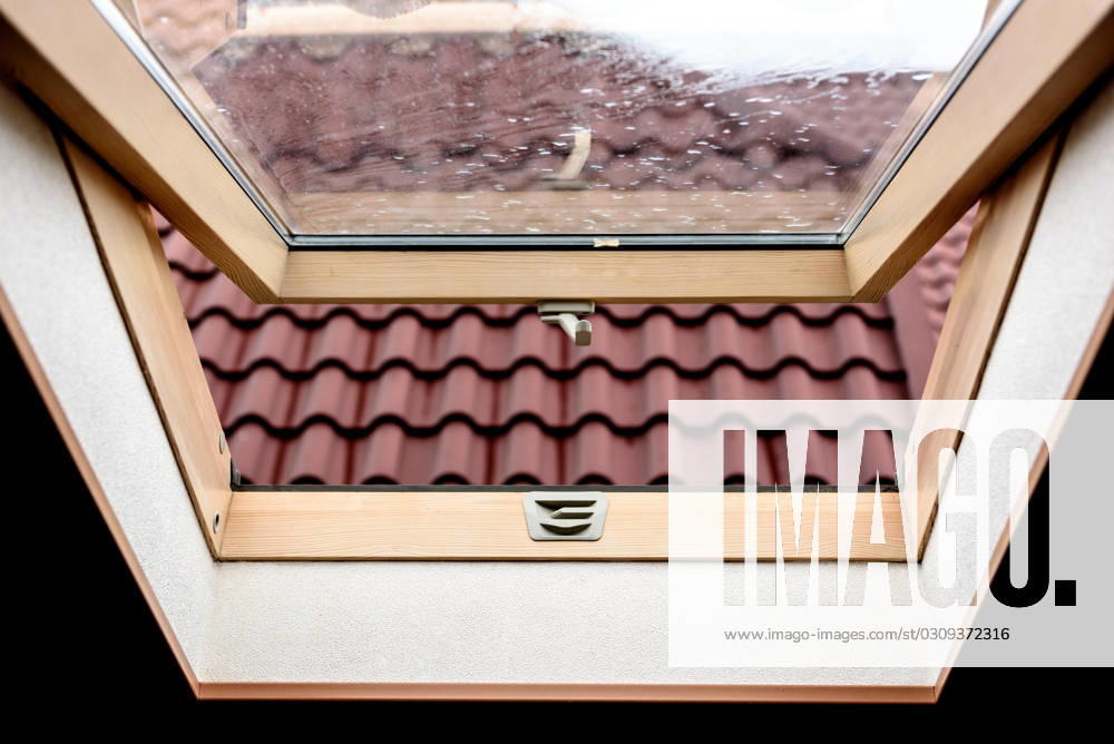 Open wooden attic window open wooden attic window overlooking the street ,model released, Symbolfoto ,property released