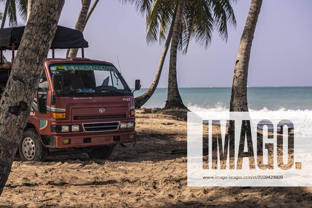 PLAYA LIMON, DOMINICAN REPUBLIC 28 DECEMBER 2019: Minibus on the Caribbean beach Minibus on the Caribbean beach