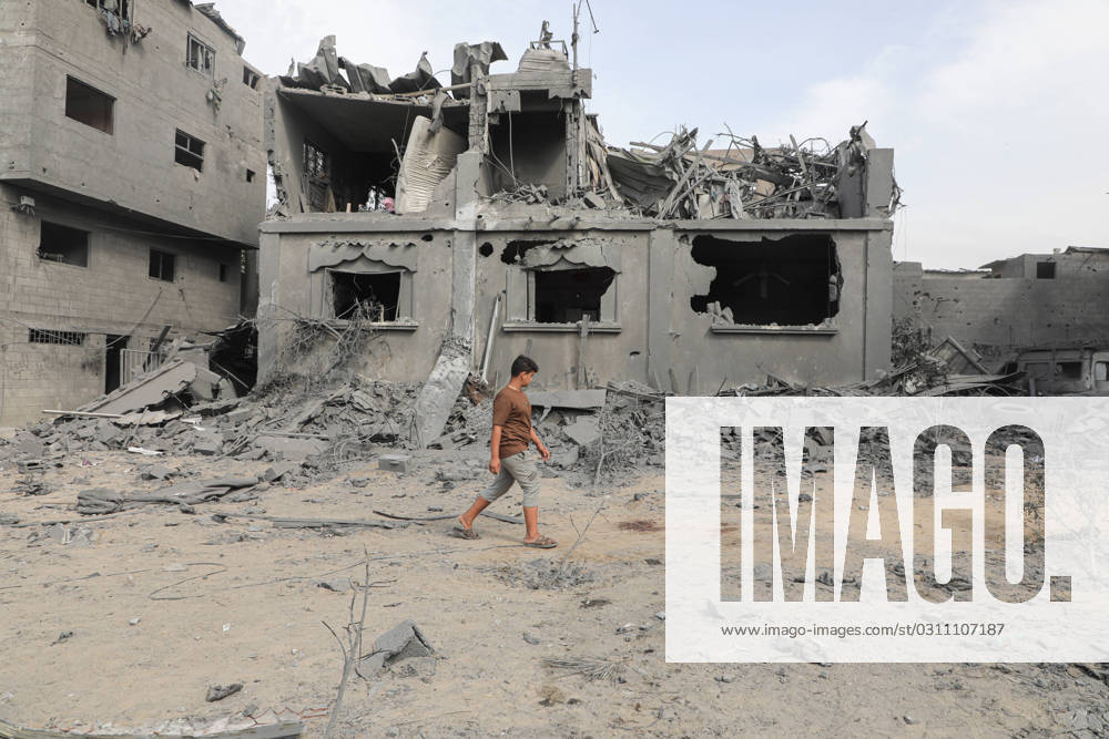 Palestinians search through rubble of buildings that were destroyed during Israeli air strike on El-Nuseirat Palestinians search through rubble of buildings that were destroyed during Israeli air strike on El-Nuseirat central of Gaza Strip. Photo by Naaman Omar apaimages El-Nuseirat Gaza Strip Palestinian Territory 291023_Nuseirat_NAA_00(3)