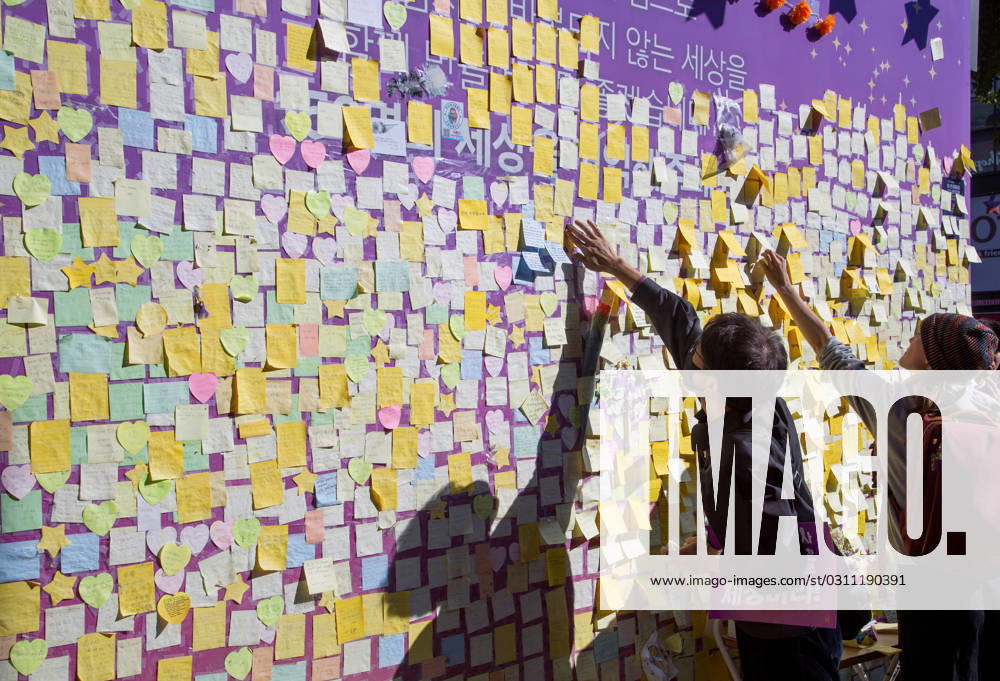 Itaewon tragedy, Oct 29, 2023 : People mourn for the perished in an alleyway, the site of the Itaewon crowd crush during Halloween celebrations last year, in Seoul, South Korea. Thousands of people and family members of the victims gathered in central Seoul on Sunday to cherish the memories of the deceased at a memorial event marking the first anniversary of the deadly Itaewon crowd crush that claimed 159 lives. They demanded a probe into the disaster and punishment of officials found responsible for the tragedy. , aflo_234062998.jpg,
