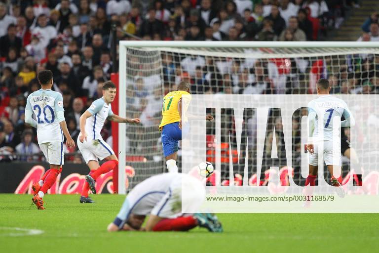 England v Brazil International Friendly L?nderspiel Fernandinho of Brazil has a shot on goal that hits the post as Eric Dier of England lays on the ground injured during the International Friendly match at Wembley Stadium, London Content Not Available For UK Newspapers