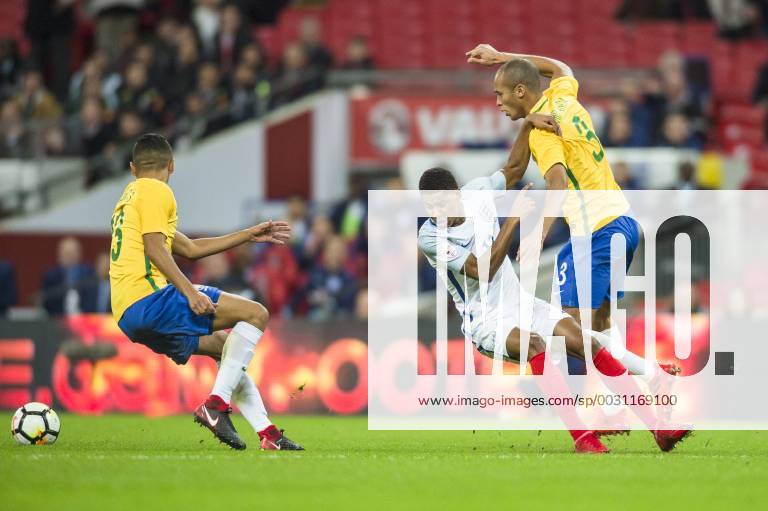 Marcus Rashford of England see s his progress thwarted by Miranda of Brazil during the International Friendly Länderspiel match between England and Brazil at Wembley Stadium, London, England on 14 November 2017.
