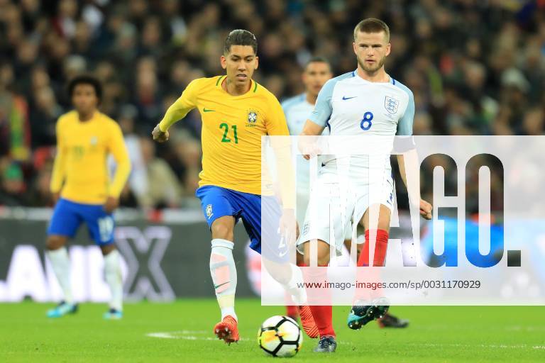 14th November 2017, Wembley Stadium, London, England; International football friendly, England versus Brazil; Eric Dier of England is under pressure from Roberto Firmino of Brazil ActionPlus11951533