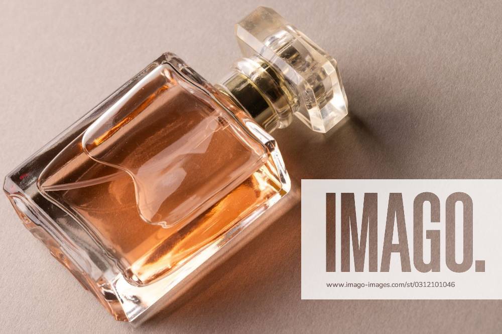 Close up of beauty product perfume bottle with copy space on brown background Close up of beauty product perfume bottle with copy space on brown background. Health and beauty, beauty product, make up and colour concept., model released, , property released, Cape Town, South Africa, 14.09.2023, 4262252.jpg, close,beauty product,perfume bottle,copy space,brown background,health,make,colour,concept,medical,medicine,care,healthy,healthcare,background,closeup,design,isolated,illustration,white,business,symbol,abstract,technology,treatment,graphic,hospital,sign,person,beauty,product,perfume,bottle,copy,space,brown
