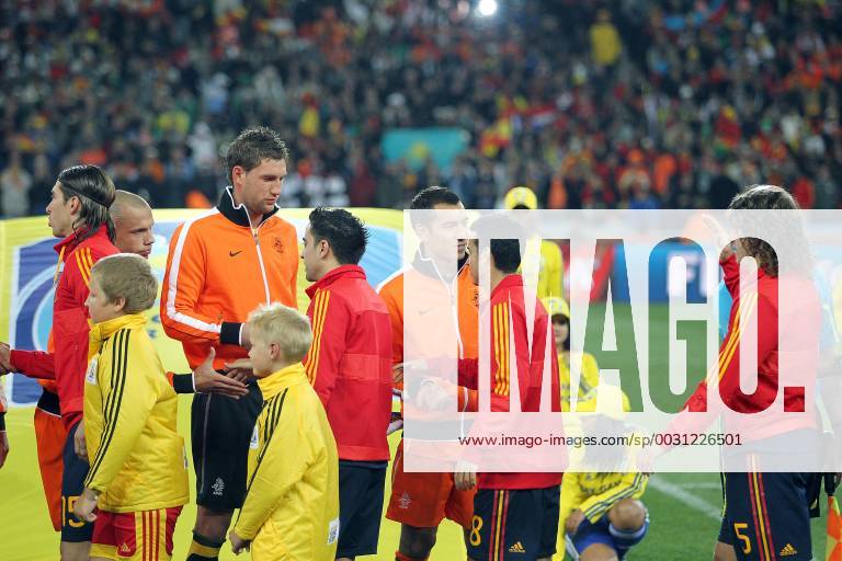 Wk2010 wk 2010 johannesburg 11 07 2010 soccer city stadium world cup final netherlands spain 0 1 after renewal march stekelenburg giovannivan bronckhorst xavi carles puyol netherlands spain