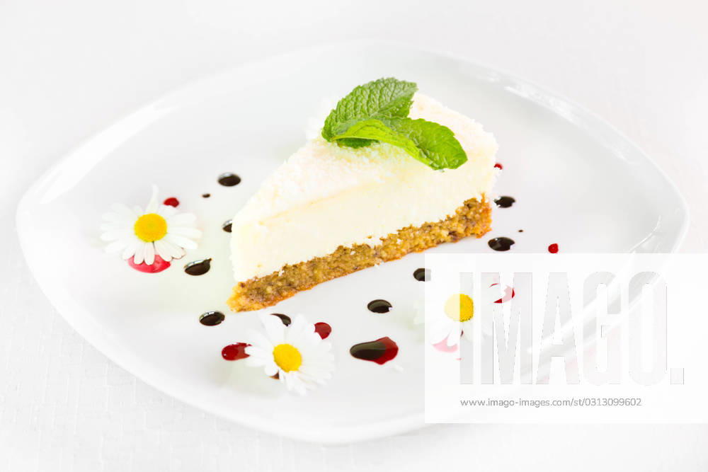 Dessert - Cheesecake with Green Mint decorated with dasiy flowers and decorated with fruit syrup drops. , 13999956.jpg, cheese cake, cheesecake, cake, dessert, slice, white, food, sweet, cream, delicious, cream cake, piece, gourmet, fresh, eat, leaf, creamy, pastry, plate, cheese, closeup, decoration, mint, dish, green, tasty, sauce, small, yummy, cut, snack, portion, bakery, restaurant, baked, cold, drips, wedge, summer, yellow, place setting, elegant, gourmet dessert, dessert pie, dairy products, party, daisy flowers, daisies, flowers, RECORD DATE NOT STATED