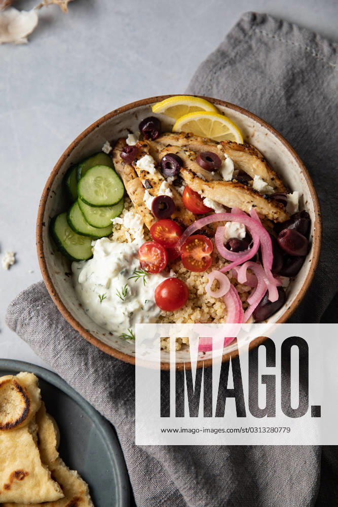 IMAGO Creative, Food, Pickled Onions Healthy lunch bowl with greek chicken, feta and tzatziki Sandpoint, Idaho, United States R_LYWPRM220325-940786-01