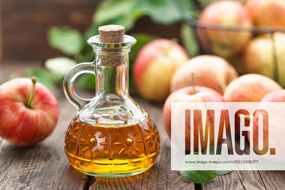 Apple vinegar , 23022772.jpg, vinegar, apple, bottle, glass, fruit, healthy, food, fresh, organic, ingredient, background, liquid, wooden, acid, cooking, dressing, table, natural, rustic, nutrition, leaf, sour, raw, cuisine, kitchen, apple vinegar, RECORD DATE NOT STATED