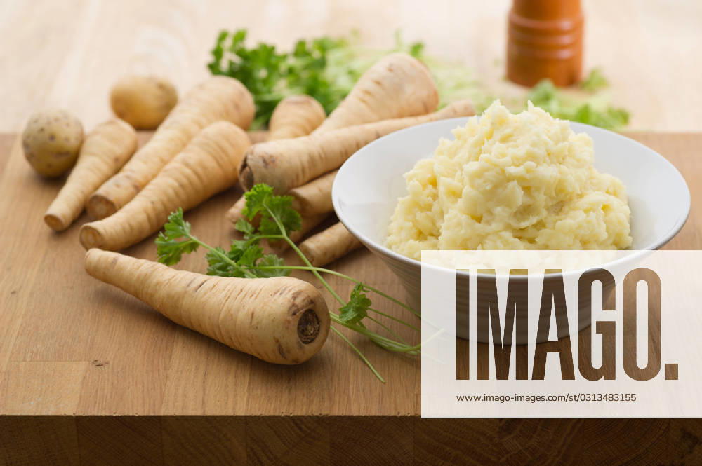 Homemade parsnip and potato mash with parsley. , 23560244.jpg, food, free, gluten, homemade, mash, mashed, parsley, parsnip, potato, vegetarian, RECORD DATE NOT STATED