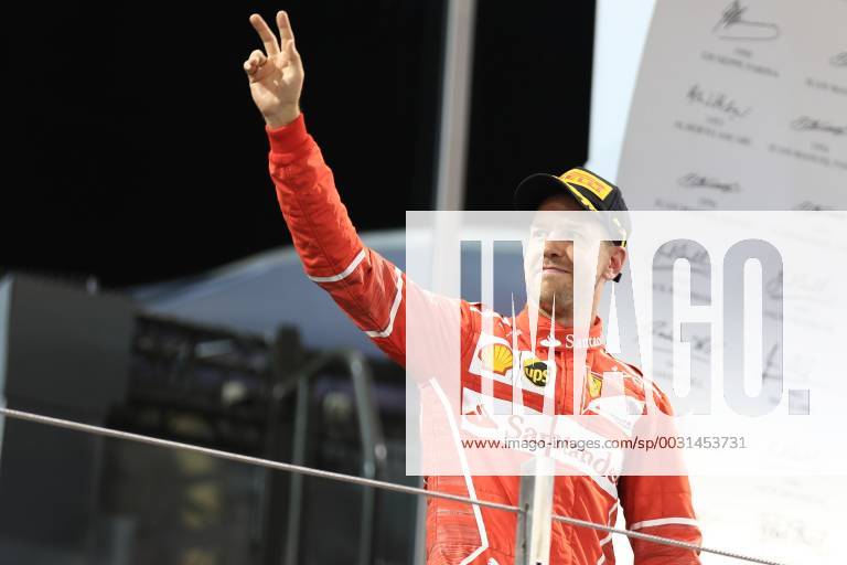 26th November 2017, Yas Marina Circuit, Abu Dhabi, UAE; Abu Dhabi Formula One Grand Prix, Sunday race day; Sebastian Vettel - Scuderia Ferrari celebrates his 3rd place finish ActionPlus11956617