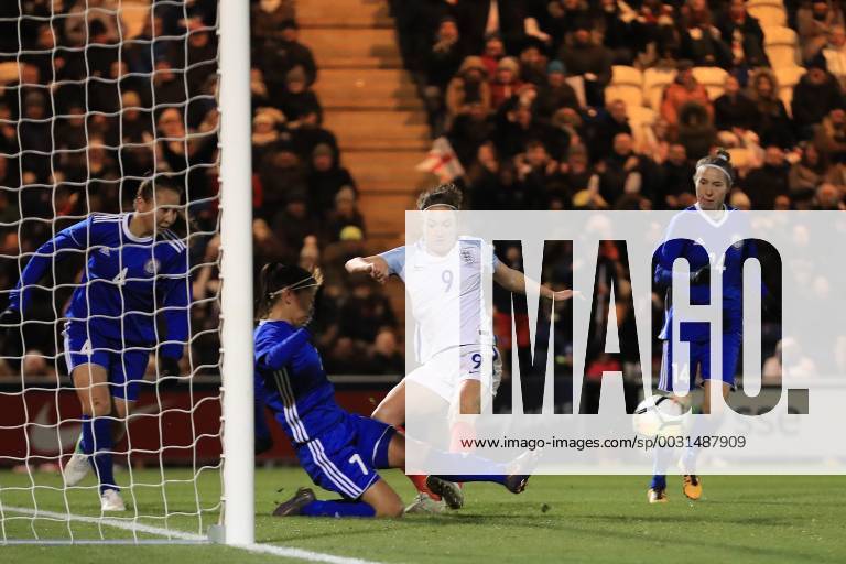 28th November 2017, Weston Homes Community Stadium, Colchester, England; Womens World Cup Qualification, England Women versus Kazakhstan Women; Shokhista Khojasheva of Kazakhstan tackles Jodie Taylor of England and the attempt flies clear ActionPlus11957140