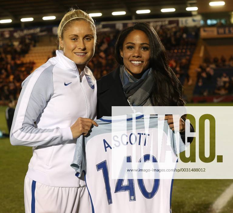 England Women v Kazakhstan Women 2019 FIFA Womens World Cup Qualifer Steph Houghton of England presents Alexandra Virina Scott a shirt to commemorate her 140 appearances for the England Women s national team Nationalteam before the 2019 FIFA Women s World Cup Qualifying match at the Weston Homes Community Stadium, Colchester Content Not Available For UK Newspapers
