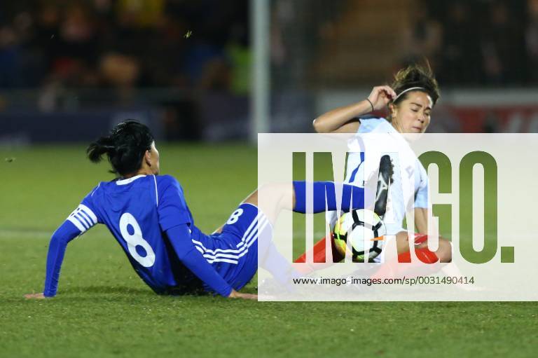 Colchester, England, United Kingdom - England Women s Fara Williams gets tackled by Begaim Kirgizbaeva of Kazakhstan Women s ..during 2019 FIFA Women s World Cup Qualifier match between England Women and Kazakhstan Women at Weston Homes Community Stadium, Colchester, England on 28 Nov 2017. England v Kazakhstan - FIFA Women s World Cup Qualifier - ZUMAn230 20171128_zaa_n230_463