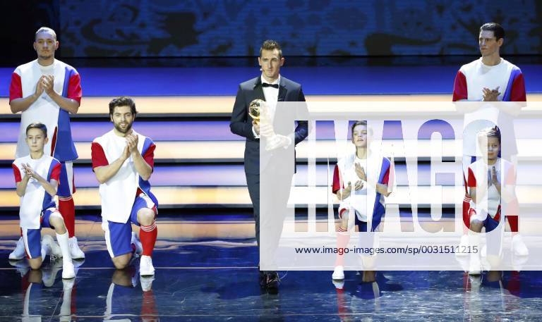 2018 World Cup draw Former Germany striker Miroslav Klose walks on stage with the World Cup trophy at the draw for the 2018 soccer World Cup finals in Moscow on Dec. 1, 2017.