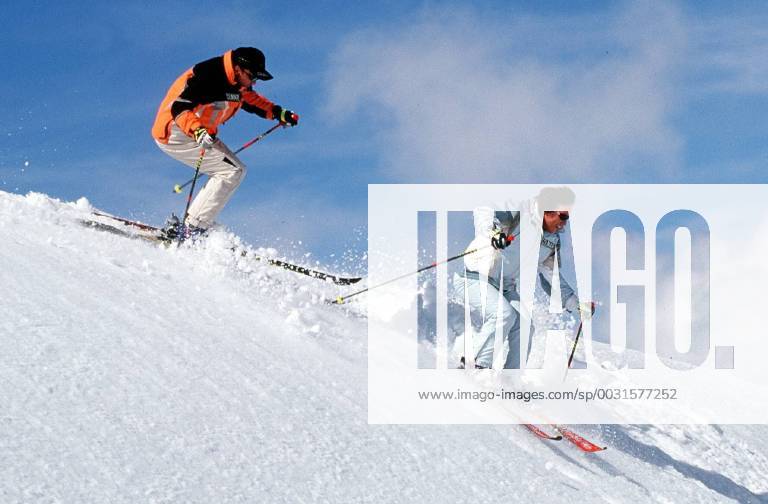 Rosi Mittermaier and Christian Neureuther skiing Our picture shows Rosi Mittermaier and Christian Neureuther skiing on the Tiefenbachferner Glacier in Tyrol Sülden Austria