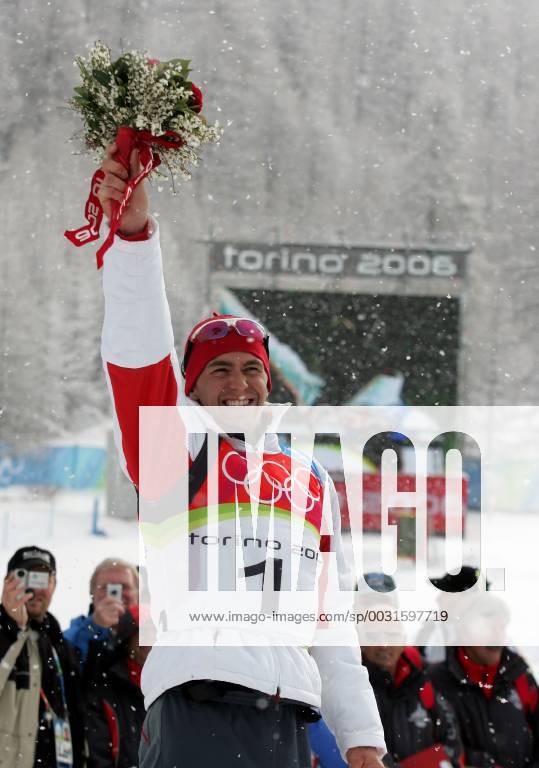 Michael Greis is pleased at the award ceremony in San Sicario on 25 02 2006 biathlon Olympic Games 2006 San Sicario, Italy