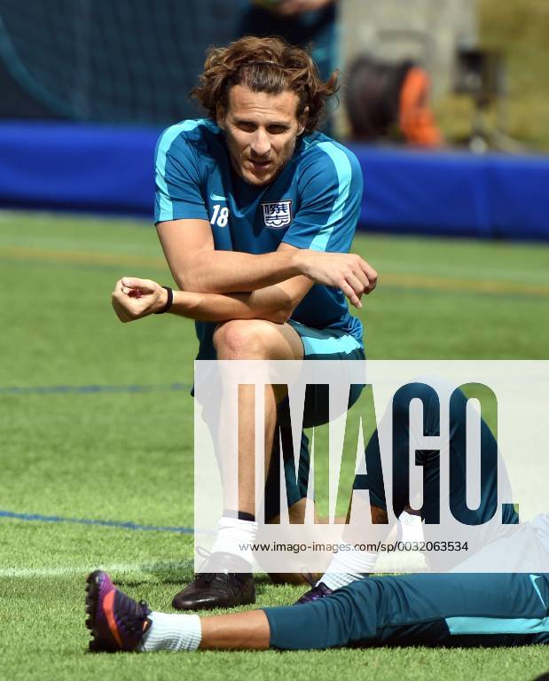 Uruguayan football player Diego Forlan takes part in the first training session at the Kitchee training centre after joining the Kitchee SC of the Hong Kong Premier League in Hong Kong, China, 13 January 2018. Diego Forlan encircled by crowds of fans at the Kitchee training centre pbu738702_04