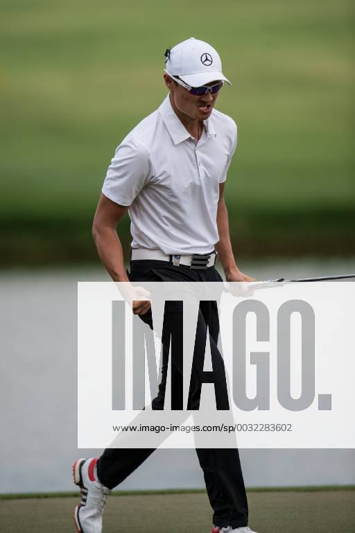 Li Haotong of China celebrates the winning putt during the Omega Dubai Desert Classic European Tour 2018 at the Emirates Golf Club, Dubai, UAE on 28 January 2018.