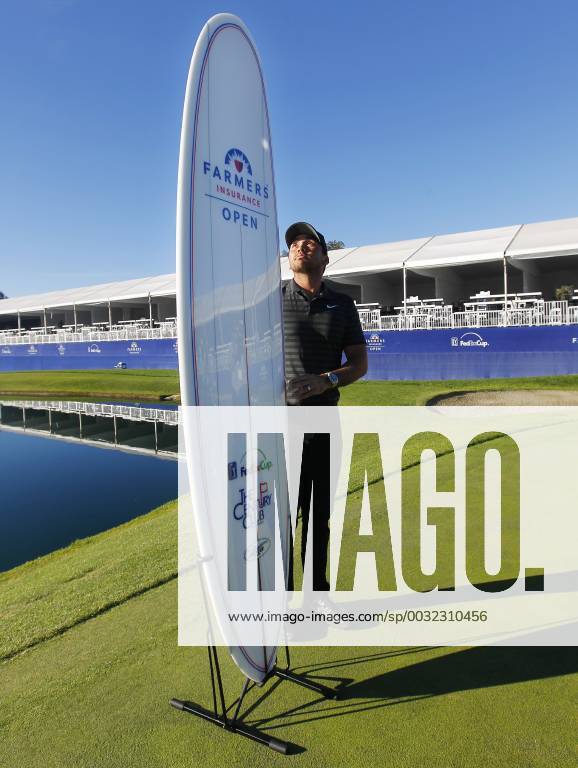 San Diego, CA, USA - Jason Day stands with a surfboard trophy after winning Farmers Insurance Open at the Torrey Pines Golf Course on January 29, 2018. Farmers Insurance Open Playoff - ZUMAs44_ 81732916st