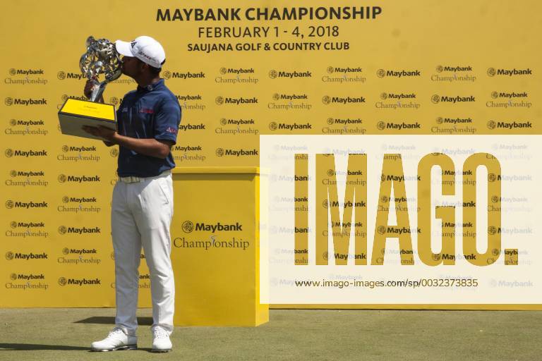 Shah Alam, Kuala Lumpur, Malaysia - Shubhankar Sharma pro golf player from India seen kissing his Maybank Championship trophy after he won by the score of 21 under 267 during day four...The Maybank Championship 2018 golf event is being hosted on 1st to 4th February 2018 at Saujana Golf & Country Club. Maybank prize ceremony - ZUMAs197 81793026st