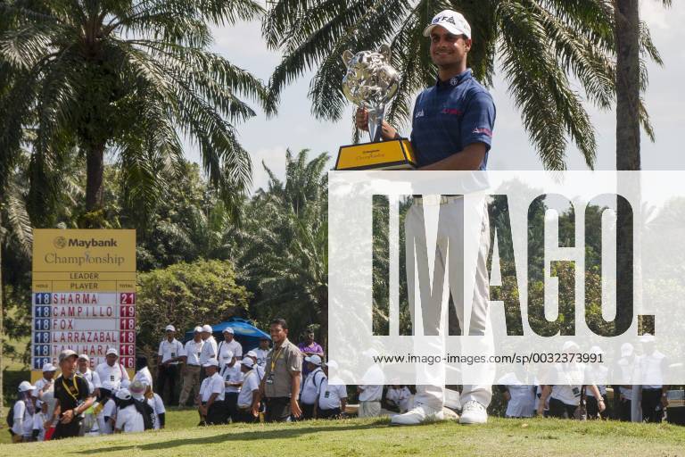 Shah Alam, Kuala Lumpur, Malaysia - Shubhankar Sharma pro golf player from India poses with the Maybank Championship trophy after he won by the score of 21 under 267 during day four...The Maybank Championship 2018 golf event is being hosted on 1st to 4th February 2018 at Saujana Golf & Country Club. Maybank prize ceremony - ZUMAs197 81793046st