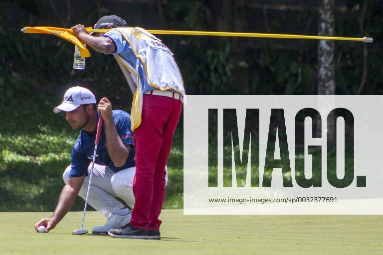 Shah Alam, Kuala Lumpur, Malaysia - Shubhankar Sharma is seen with his caddie while he placing the ball at hole 16 on the last day of Maybank Championship 2018...The Maybank Championship 2018 golf event is being hosted on 1st to 4th February at Saujana Golf & Country Club. KL: Maybank championship last day - ZUMAs197 81794880st