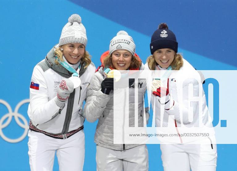 Themen der Woche - SPORT (180213) -- PYEONGCHANG, Feb. 13, 2018 -- Champion Laura Dahlmeier (C) from Germany, second-placed Anastasiya Kuzmina (L) from Slovakia and third-placed Anais Bescond from France pose for photos during the medal ceremony of women s 10km pursuit event of biathlon at the 2018 PyeongChang Winter Olympic Games Olympische Spiele Olympia OS at the Medal Plaza in PyeongChang, South Korea, on Feb. 13, 2018. ) (SP)OLY-SOUTH KOREA-PYEONGCHANG-BIATHLON-WOMEN S 10KM PERSUIT-MEDAL CEREMONY BaixXuefei