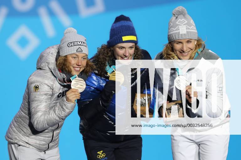 OLYMPICS - 2018 Winter Olympics PYEONGCHANG,SOUTH KOREA,16.FEB.18 - OLYMPICS,BIATHLON - Olympic Winter games Winterspiele Spiele Summer games PyeongChang 2018, Medals Plaza, 15km biathlon, ladies, award ceremony. Image shows Laura Dahlmeier (GER), Hanna Oeberg (SWE) and Anastasiya Kuzmina (SVK). GEPAxpictures xMathiasxMandl