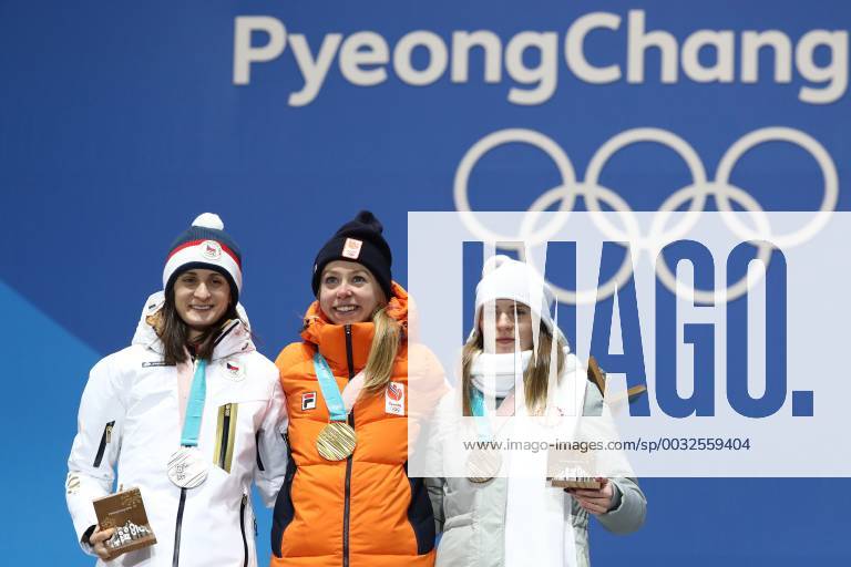 PYEONGCHANG, SOUTH KOREA â€“ FEBRUARY 17, 2018: Silver medallist Martina Sablikova of the Czech Republic, gold medallist Esmee Visser of the Netherlands, and bronze medallist Natalya Voronina, Olympic Athlete from Russia, (L-R) pose at a victory ceremony for the ladies 5000m Speed skating Eisschnelllauf at the 2018 Winter Olympic Games Olympische Spiele Olympia OS Valery Sharifulin TASS TS074587