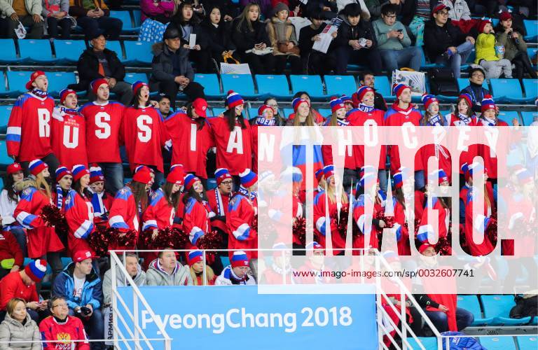 - SPORT GANGNEUNG, SOUTH KOREA - FEBRUARY 19, 2018: Russian fans attend a women s semifinal Ice hockey Eishockey match between Canada and Olympic Athletes from Russia as part of the 2018 Winter Olympic Games Olympische Spiele Olympia OS at the Gangneung Hockey Centre. Sergei Bobylev TASS TS074AD9