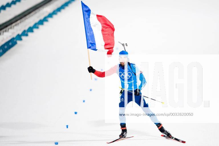 Martin Fourcade of France gold celebrates with the flag in the Biathlon Mixed Relay during day eleven of the 2018 Winter Olympics on February 20 2018 in Pyeongchang Photo Carl Sandin BILDBYRAN code CS 57999 309