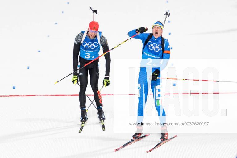 Arnd Peiffer of Germany and Dominik Windisch of Italy at the finish line after the Biathlon Mixed Relay during day eleven of the 2018 Winter Olympics on February 20 2018 in Pyeongchang Photo Carl Sandin BILDBYRAN code CS 57999 309