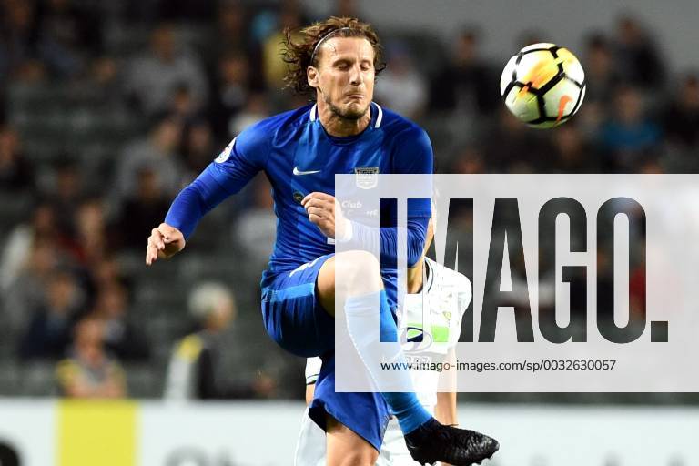 Uruguayan footballer Forlan corazo Diego of Hong Kong s Kitchee SC kicks the ball to make a pass against South Korea s Jeonbuk Hyundai Motors F.C. in the Group E match during the 2018 AFC Champions League in Hong Kong, China, 20 February 2018. Jeonbuk Hyundai Motors defeated Kitchee SC 6-0. Jeonbuk Hyundai Motors slashes Kitchee SC during AFC group match scr123789