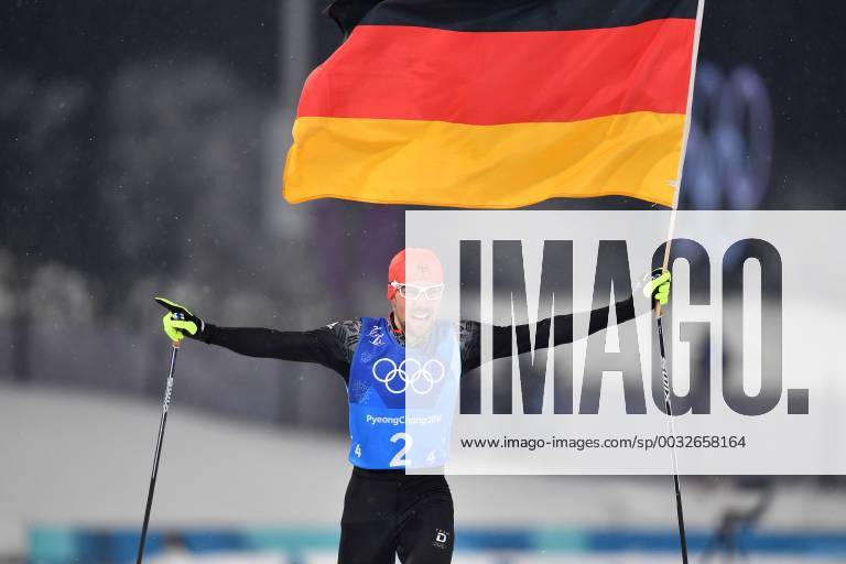 Final runner Johannes RYDZEK GER runs with the Germany flag Flag finish Target Finish Action 1 place Olympic champion Winner Winner winner Olympic Champion Cheers Joy Enthusiasm Emotion Cheer Cheers Nordic Combined Team Gundersen LH 4x5 km Nordic Combined Team Relay Alpensia Ski Cross Center 2018 Winter Olympics from 09 02 25 02 2018 in PyeongChang South Korea