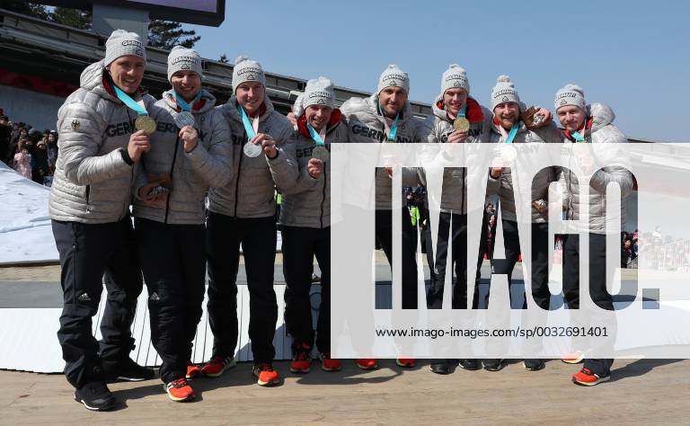 (180225) -- PYEONGCHANG, Feb. 25, 2018 -- Team Germany that won the gold medal and silver medal pose for photos together after the 4-man event of bobsleigh at the 2018 PyeongChang Winter Olympic Games Olympische Spiele Olympia OS at Olympic Sliding Centre, PyeongChang, South Korea, Feb. 25, 2018. The two teams won the gold medal in a time of 3:15.85 and the silver medal in a time of 3:16.38 respectively. ) (SP)OLY-SOUTH KOREA-PYEONGCHANG-BOBSLEIGH-4-MAN BaixXuefei