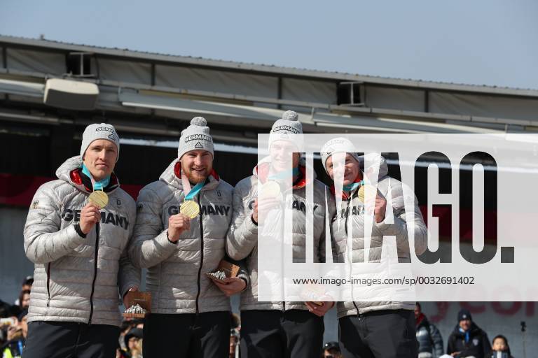 (180225) -- PYEONGCHANG, Feb. 25, 2018 -- Team Germany that won the gold medal pose for photos after the 4-man event of bobsleigh at the 2018 PyeongChang Winter Olympic Games Olympische Spiele Olympia OS at Olympic Sliding Centre, PyeongChang, South Korea, Feb. 25, 2018. The team won the gold medal in a time of 3:15.85. ) (SP)OLY-SOUTH KOREA-PYEONGCHANG-BOBSLEIGH-4-MAN BaixXuefei