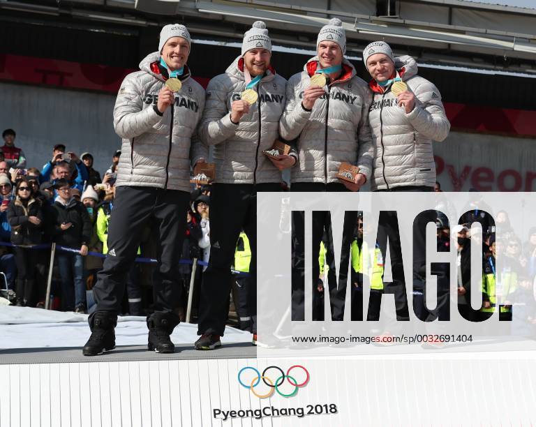 (180225) -- PYEONGCHANG, Feb. 25, 2018 -- Team Germany that won the gold medal pose for photos after the 4-man event of bobsleigh at the 2018 PyeongChang Winter Olympic Games Olympische Spiele Olympia OS at Olympic Sliding Centre, PyeongChang, South Korea, Feb. 25, 2018. The team won the gold medal in a time of 3:15.85. ) (SP)OLY-SOUTH KOREA-PYEONGCHANG-BOBSLEIGH-4-MAN BaixXuefei