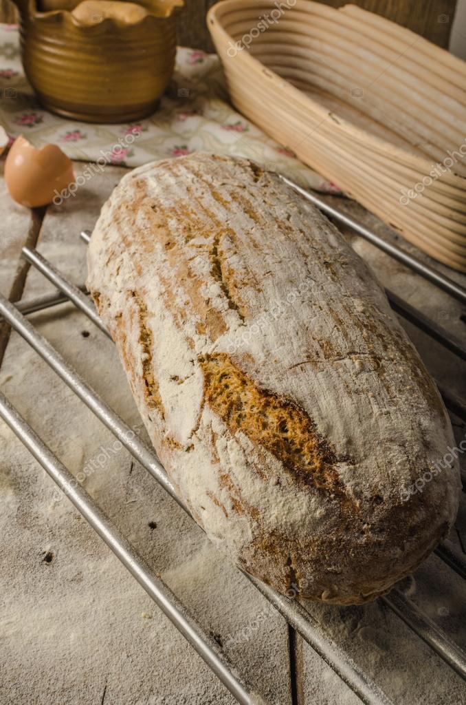 Homemade rustic bread, baked in oven, wheat leaven, breaded in a basket