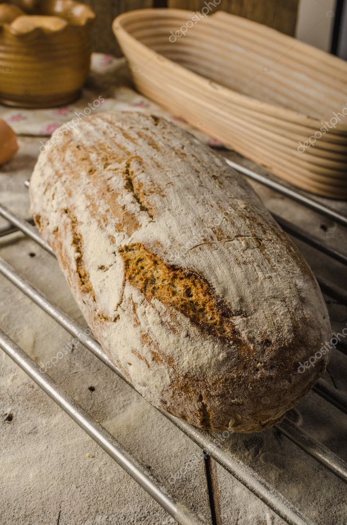 Homemade rustic bread, baked in oven, wheat leaven, breaded in a basket