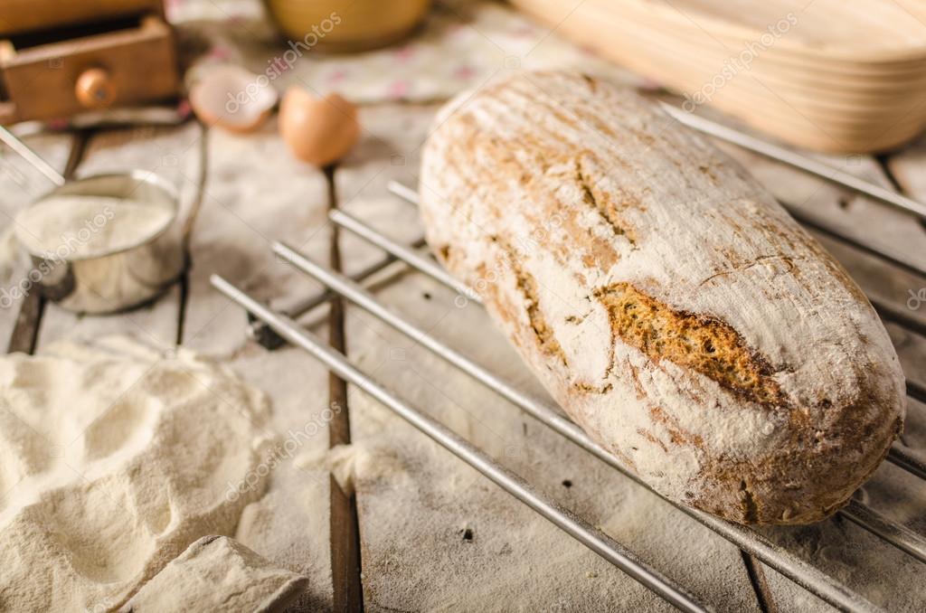 Homemade rustic bread, baked in oven, wheat leaven, breaded in a basket