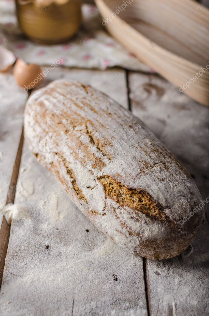 Homemade rustic bread, baked in oven, wheat leaven, breaded in a basket