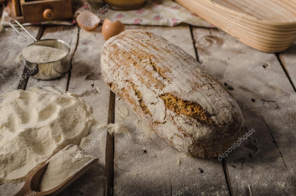 Homemade rustic bread, baked in oven, wheat leaven, breaded in a basket