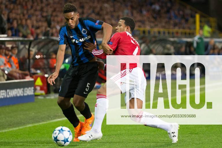 - BRUGGE, BELGIUM: Club s Jean-Charles Castelletto and Manchester s Memphis Depay fight for the ball during a soccer game between Belgian first league team Club Brugge KV and British club Manchester United ManU FC in Brugge, Wednesday 26 August 2015, the return game of the play-offs of the UEFA Champions League competition. Manchester United won the first leg 3-1. KURTxDESPLENTER x84637856x