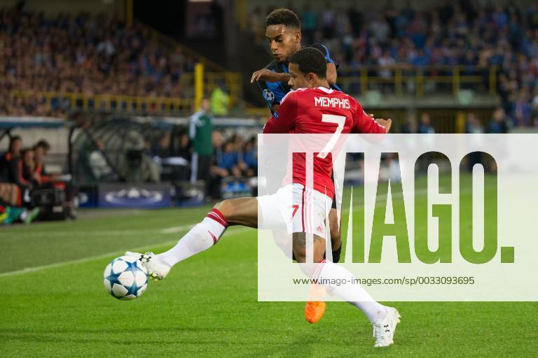 - BRUGGE, BELGIUM: Club s Jean-Charles Castelletto and Manchester s Memphis Depay fight for the ball during a soccer game between Belgian first league team Club Brugge KV and British club Manchester United ManU FC in Brugge, Wednesday 26 August 2015, the return game of the play-offs of the UEFA Champions League competition. Manchester United won the first leg 3-1. KURTxDESPLENTER x84637873x