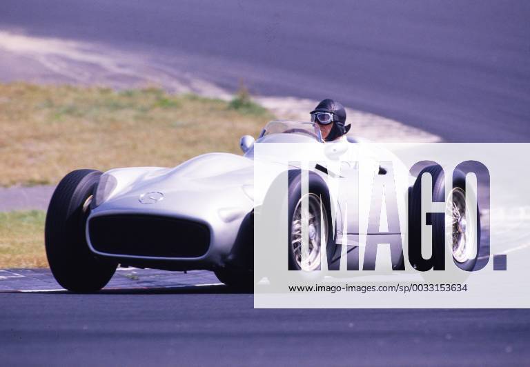 The Silver Arrow Mercedes Benz W 196 R was a Formula One racing car of the 1954 season. 1955 Alongside the freestanding wheel design for winding raceways, there was also a streamline fairing for high speed trains known for the miracle of Reims with a double nine years after the World War and the same day as the miracle of Bern the W196 pictured here with freestanding wheels was nevertheless the more successful execution because with the 1961 1954 1955 1955 world champion other drivers besides Fangio were Stirling Moss and Hans Herrmann a W 196 was auctioned off in 2013 and brought 22 67 million euros THE IMAGE CREATED ON 16 08 1986 IN A DEMONSTRATION TRIP WITH FANGIO ON TAX ON THE NÜRBURGRING as part of the Oldtimer Grand Prix