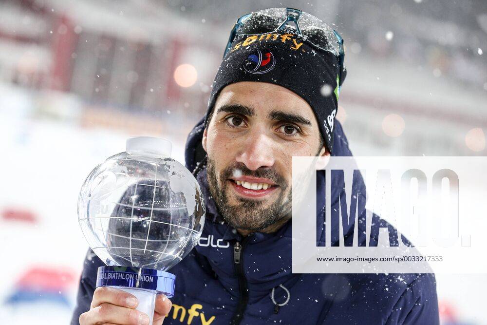 - SPORT TYUMEN, RUSSIA - MARCH 22, 2018: Gold medalist Martin Fourcade of France awarded a Big Crystal Globe for the 2017 18 IBU Biathlon World Cup highest overall total score at an award ceremony for the men s 10km sprint competition at the 2017 18 IBU Biathlon World Cup meeting in Tyumen, Russia. Mikhail Tereshchenko TASS TS078F9A