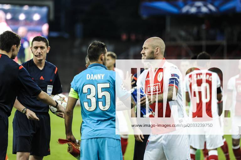 - LIEGE, BELGIUM: Zenit s Danny and Standard s Jelle Van Damme pictured at the start of the first leg match between Belgian first division soccer team Standard de Liege and Russian team FC Zenit Saint Petersburg in the playoffs for the UEFA Champions League competition, Wednesday 20 August 2014, in Liege. NICOLASxLAMBERT x61261723x